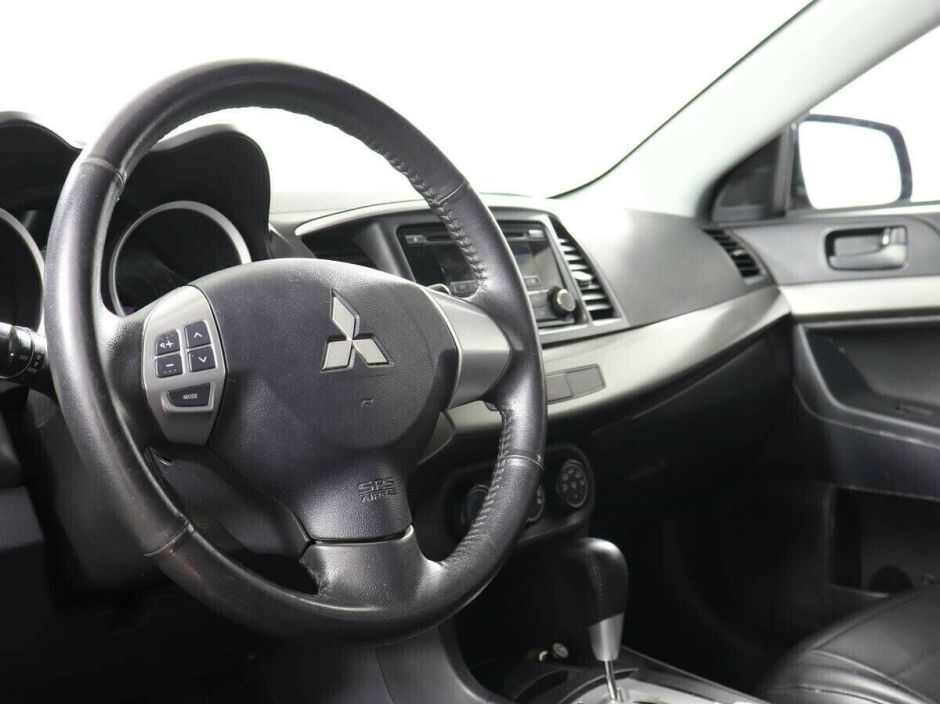 Mitsubishi Lancer, 1.6 л, АТ, 2014 фото 2