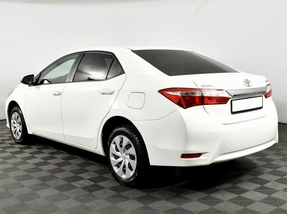 Toyota Corolla, 1.6 л, МТ, 2013 фото 6