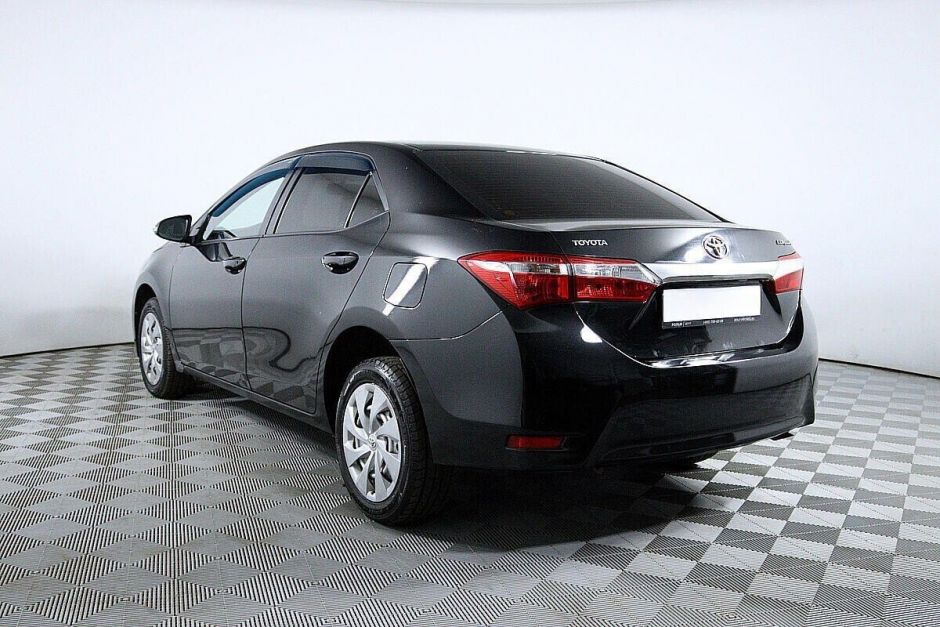 Toyota Corolla, 1.6 л, МТ, 2013 фото 6